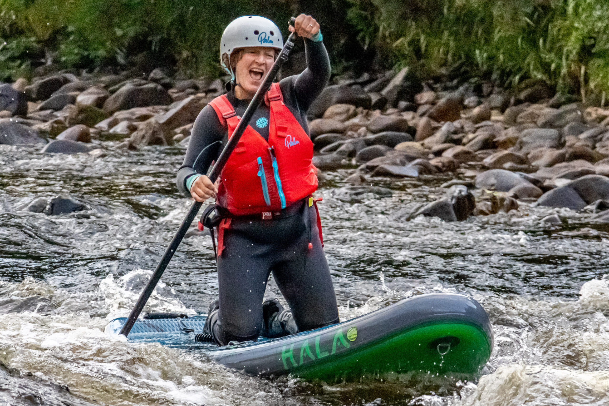 river spey paddleboarder smiling