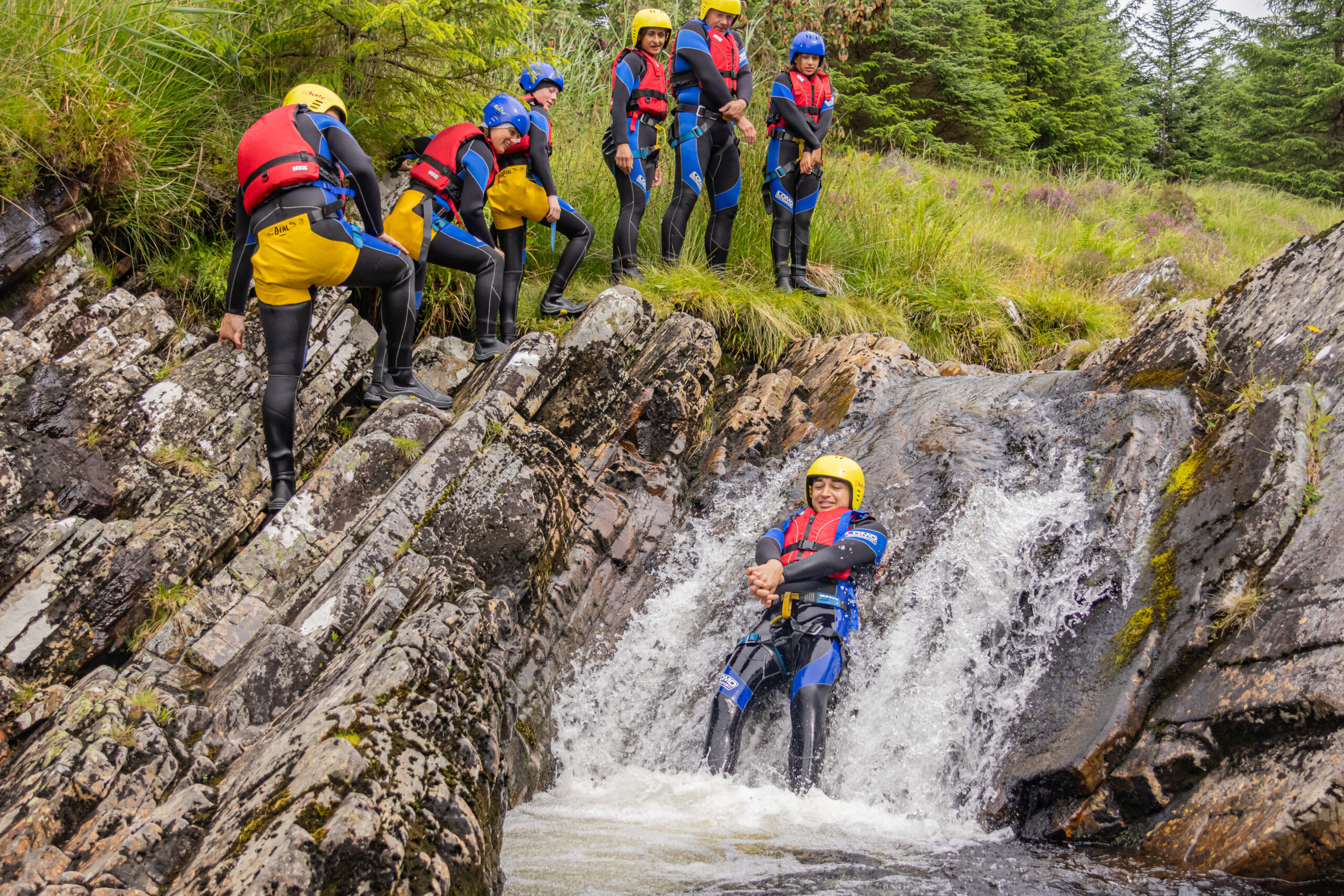 Group canyoning in Scotland
