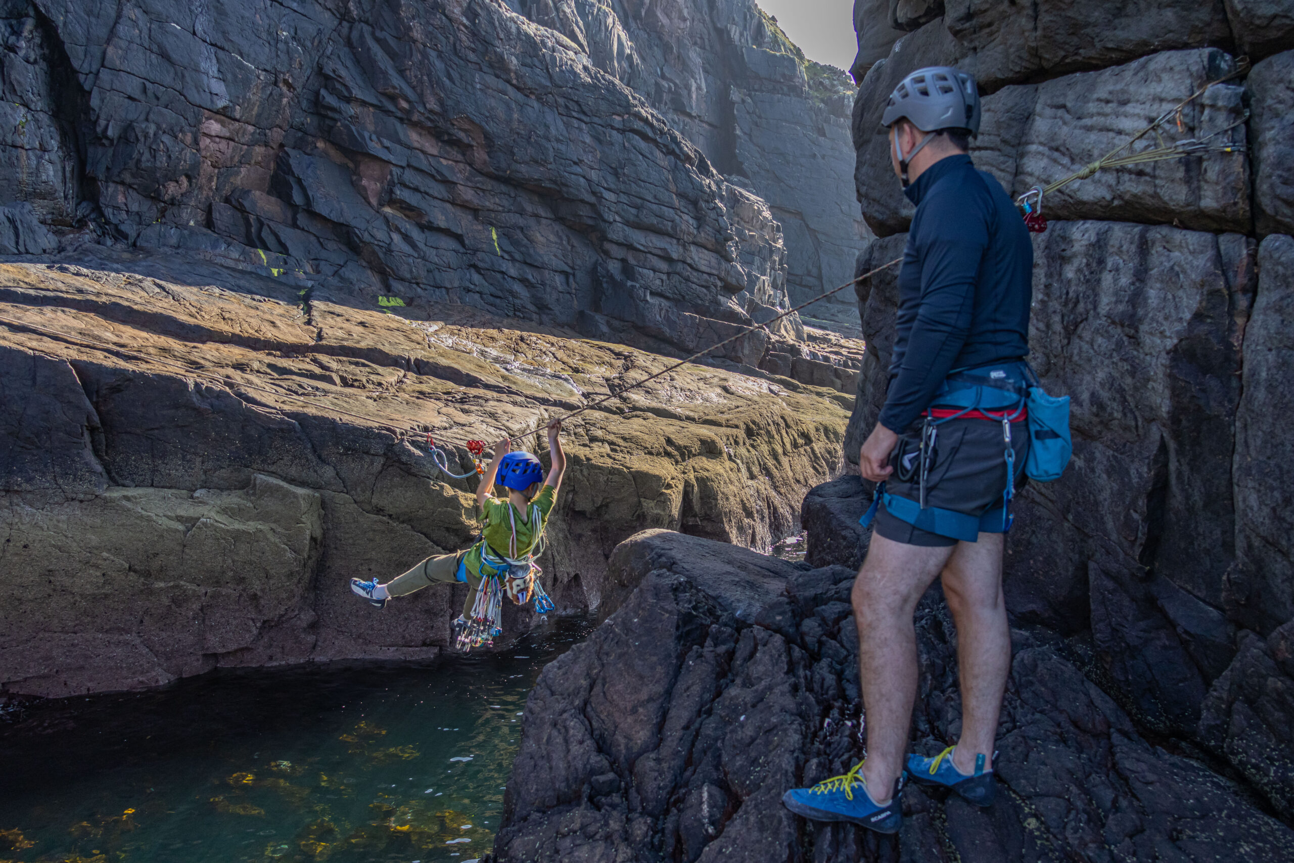 Aden crossing the sea on a tyrolean at stoer Seastack